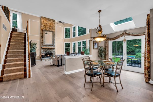 Dining room, Fireplace, Interior, Pendant Lights, Wood Texture Flooring