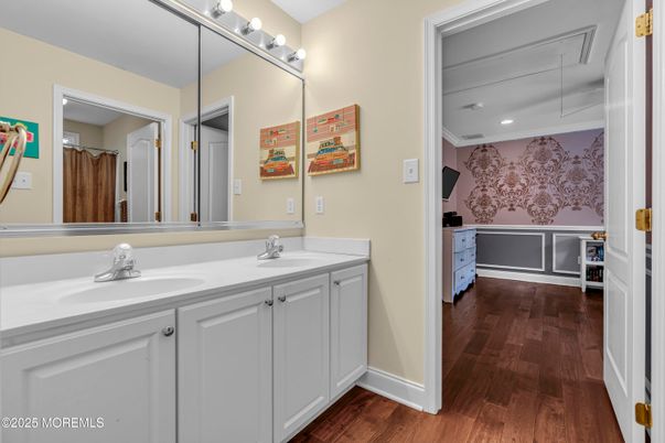 Bathroom, Dual Sink Vanities, Interior, Recessed Lighting, Wood Texture Flooring