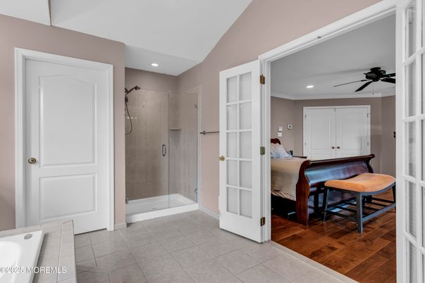 Bathroom, Bedroom, Glass Shower, Interior, Recessed Lighting, Wood Texture Flooring