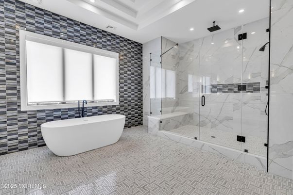Bathroom, Free Standing Baths, Glass Shower, Interior, Marble Walls, Recessed Lighting