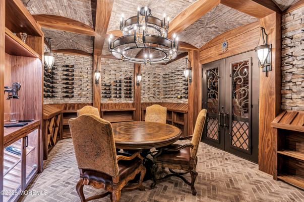 Chandelier, Dining room, Interior, Stone Walls, Wine Storage, Wooden Beams