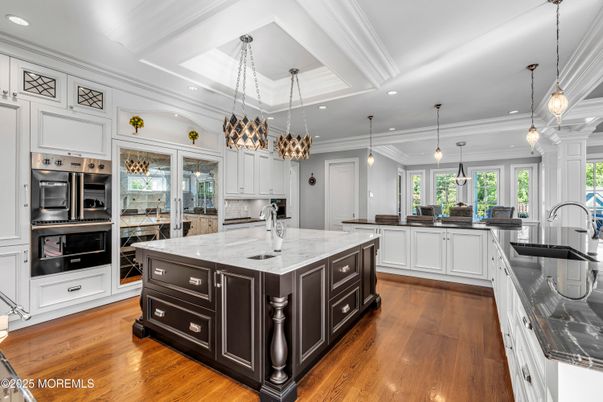 Chandelier, Interior, Kitchen, Pendant Lights, Recessed Lighting, Stainless Steel Appliances, Wood Texture Flooring