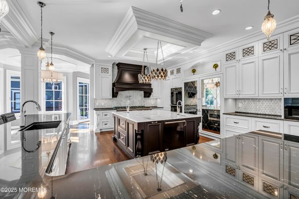 Chandelier, Interior, Kitchen, Pendant Lights, Recessed Lighting, Stainless Steel Appliances, Wood Texture Flooring