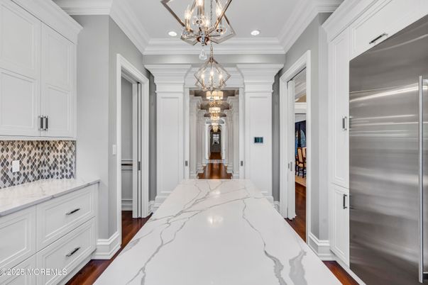 Chandelier, Interior, Kitchen, Pendant Lights, Recessed Lighting, Stainless Steel Appliances, Wood Texture Flooring