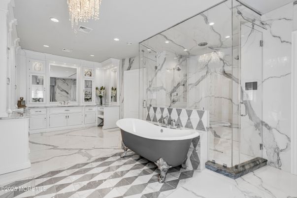 Bathroom, Chandelier, Free Standing Baths, Glass Shower, Interior, Marble, Marble Walls, Recessed Lighting