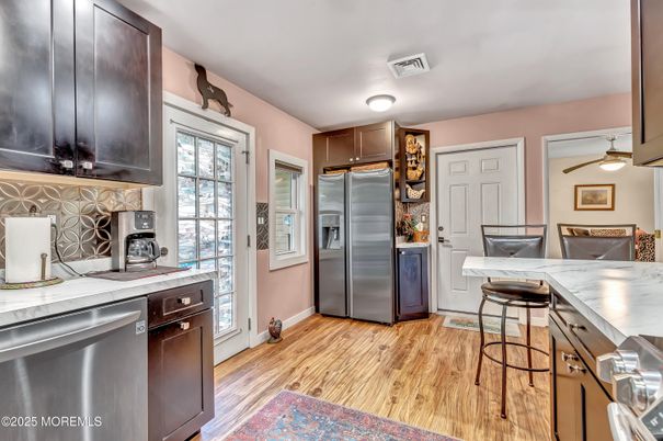 Interior, Kitchen, Stainless Steel Appliances, Tile Countertops, Wood Texture Flooring