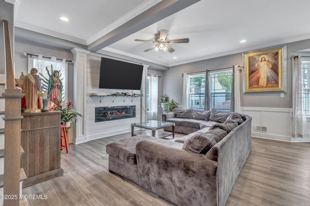 Fireplace, Interior, Living room, Recessed Lighting, Wood Texture Flooring