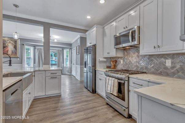 Interior, Kitchen, Pendant Lights, Recessed Lighting, Stainless Steel Appliances, Wood Texture Flooring