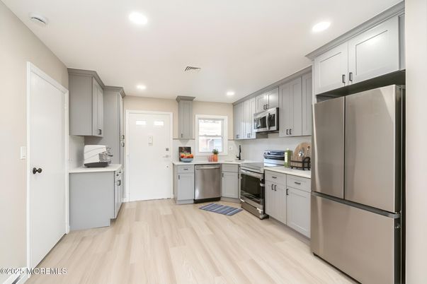 Interior, Kitchen, Recessed Lighting, Stainless Steel Appliances, Wood Texture Flooring