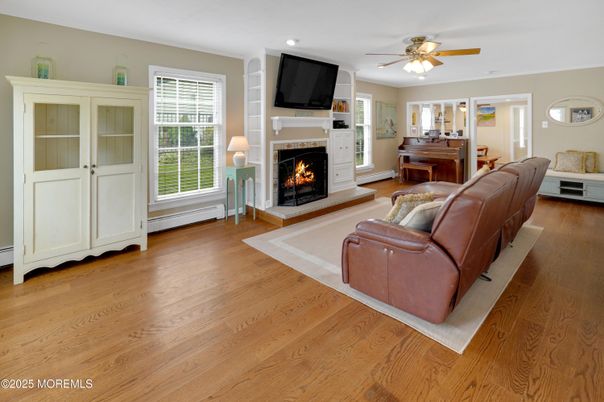 Fireplace, Interior, Piano, Recessed Lighting, Wood Texture Flooring