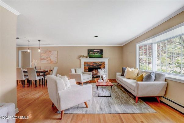 Dining room, Fireplace, Interior, Living room, Pendant Lights, Wood Texture Flooring