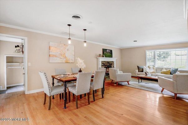 Dining room, Fireplace, Interior, Living room, Pendant Lights, Wood Texture Flooring