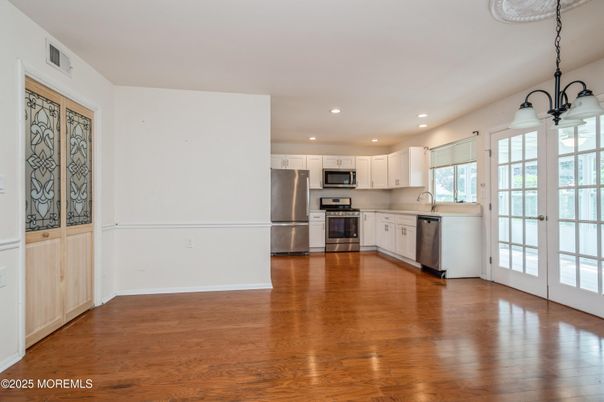 Interior, Kitchen, Pendant Lights, Recessed Lighting, Stainless Steel Appliances, Wood Texture Flooring