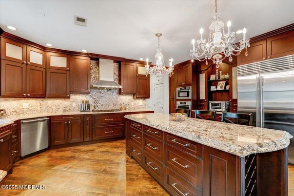 Chandelier, Interior, Kitchen, Recessed Lighting, Stainless Steel Appliances, Wood Texture Flooring