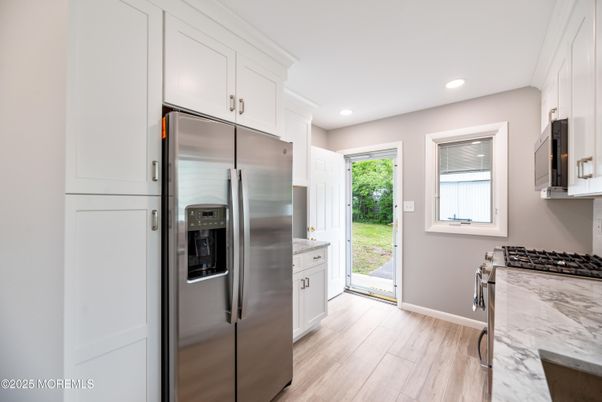 Interior, Kitchen, Recessed Lighting, Stainless Steel Appliances, Wood Texture Flooring