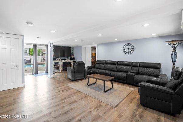 Fireplace, Interior, Living room, Recessed Lighting, Wood Texture Flooring