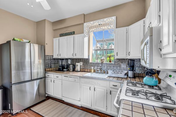 Interior, Kitchen, Tile Countertops, Wood Texture Flooring