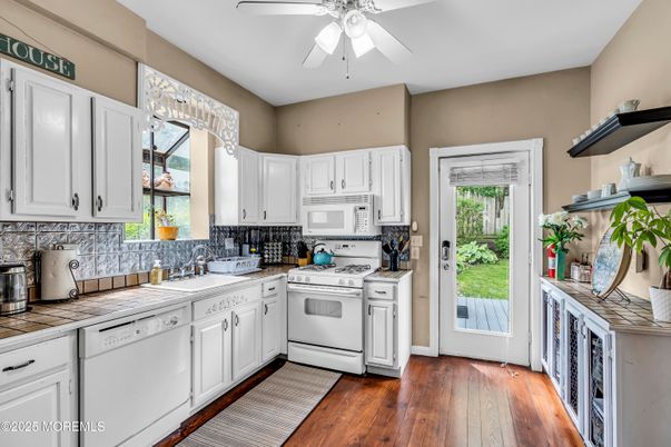 Interior, Kitchen, Tile Countertops, Wood Texture Flooring