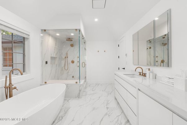 Bathroom, Dual Sink Vanities, Free Standing Baths, Glass Shower, Interior, Marble, Marble Walls, Recessed Lighting