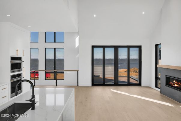 Fireplace, Interior, Kitchen, Recessed Lighting, Water, Wood Texture Flooring