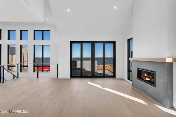 Fireplace, Interior, Recessed Lighting, Water, Wood Texture Flooring