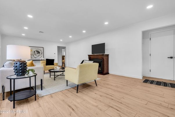 Fireplace, Interior, Living room, Recessed Lighting, Wood Texture Flooring