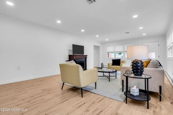 Fireplace, Interior, Living room, Recessed Lighting, Wood Texture Flooring