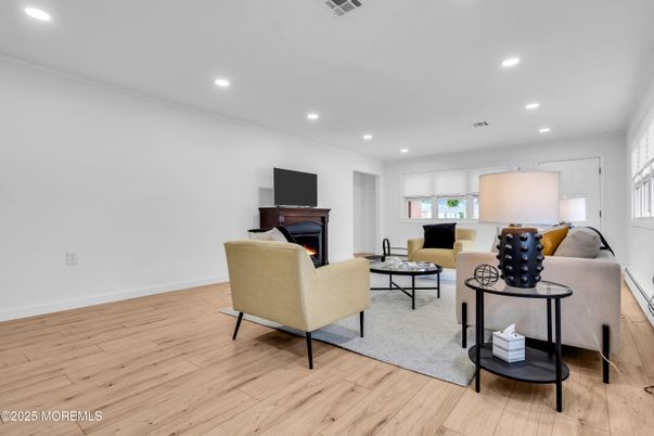 Fireplace, Interior, Living room, Recessed Lighting, Wood Texture Flooring