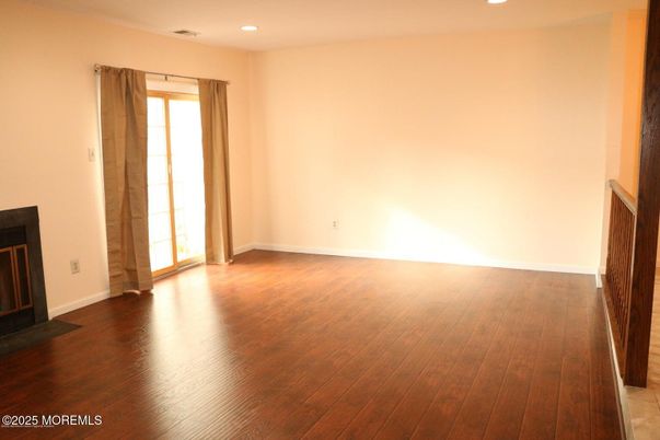 Empty room, Fireplace, Interior, Recessed Lighting, Wood Texture Flooring