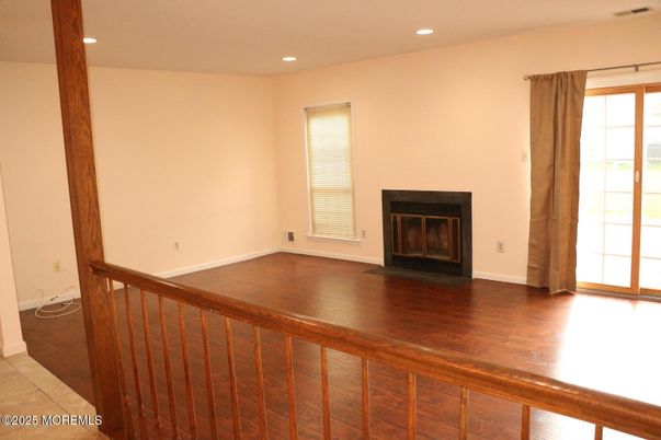 Empty room, Fireplace, Interior, Recessed Lighting, Wood Texture Flooring