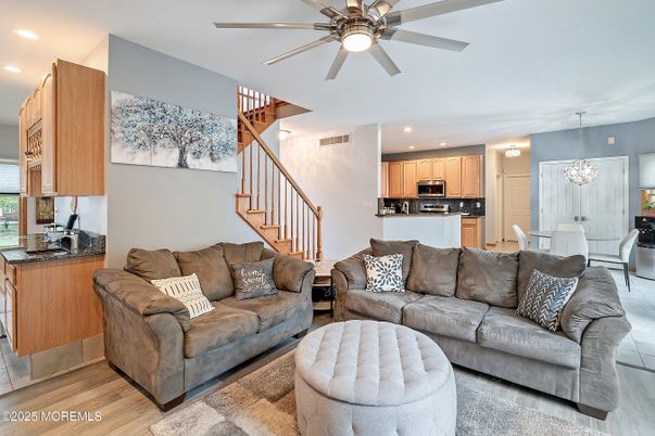 Chandelier, Dining room, Interior, Kitchen, Living room, Recessed Lighting, Stainless Steel Appliances, Wood Texture Flooring