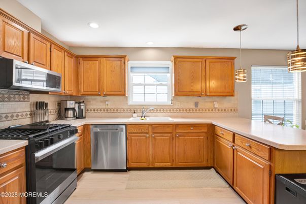 Interior, Kitchen, Pendant Lights, Recessed Lighting, Stainless Steel Appliances, Wood Texture Flooring