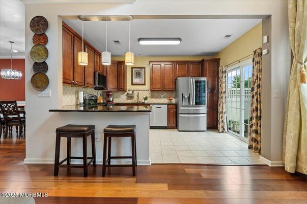 Dining room, Interior, Kitchen, Pendant Lights, Stainless Steel Appliances, Wood Texture Flooring