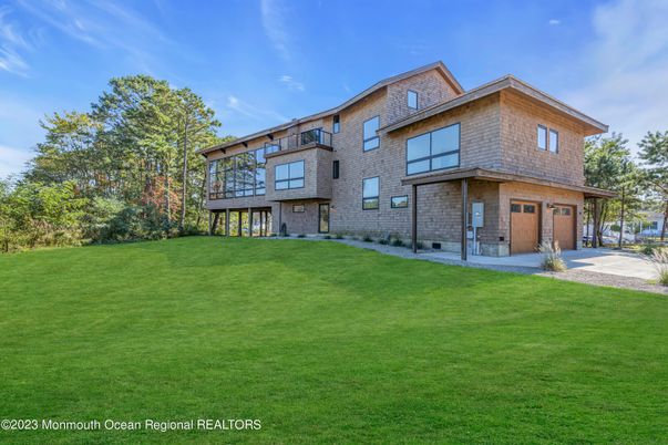 Attached, Backyard, Exterior, Facade, Brick Facade, Modern