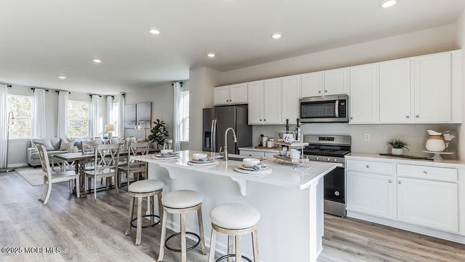 Dining room, Interior, Kitchen, Recessed Lighting, Stainless Steel Appliances, Wood Texture Flooring