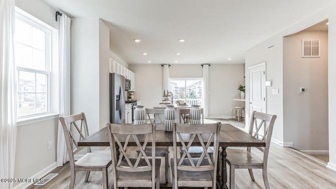 Dining room, Interior, Kitchen, Recessed Lighting, Stainless Steel Appliances, Wood Texture Flooring