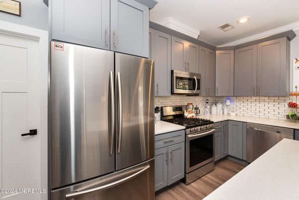 Interior, Kitchen, Recessed Lighting, Stainless Steel Appliances, Wood Texture Flooring