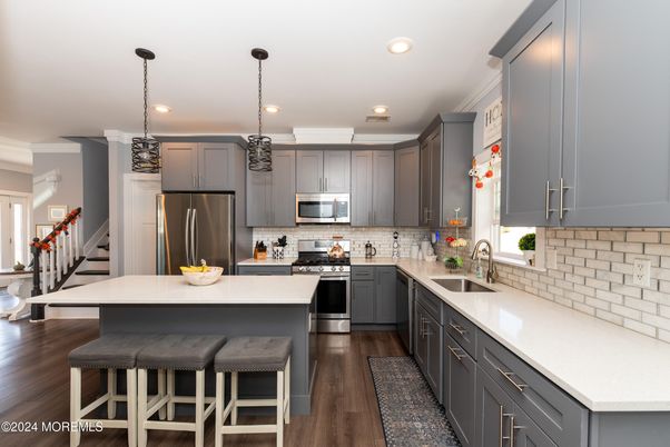 Interior, Kitchen, Pendant Lights, Recessed Lighting, Stainless Steel Appliances, Wood Texture Flooring