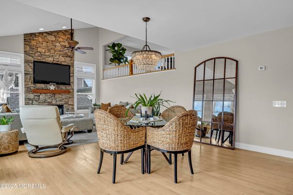 Dining room, Fireplace, Interior, Living room, Pendant Lights, Recessed Lighting, Stone Walls, Wood Texture Flooring