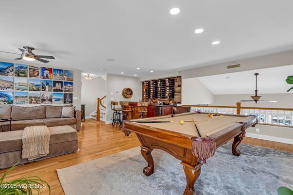 Billiard Table, Dining room, Game Room, Interior, Living room, Recessed Lighting, Wood Texture Flooring