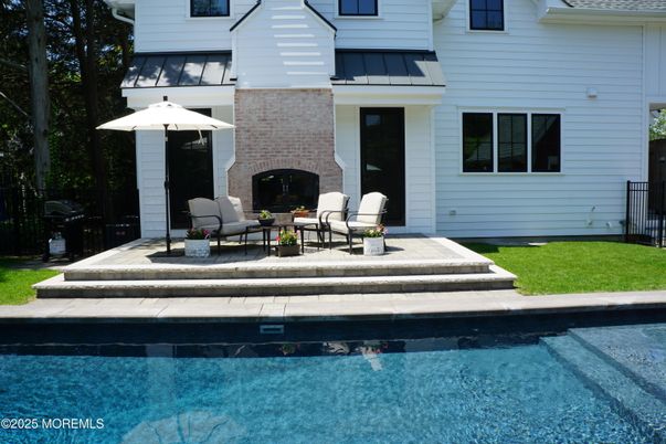 Exterior, Fireplace, Pool