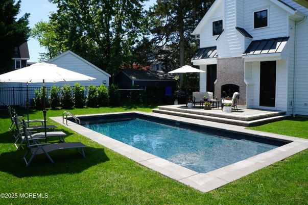 Exterior, Fireplace, Pool