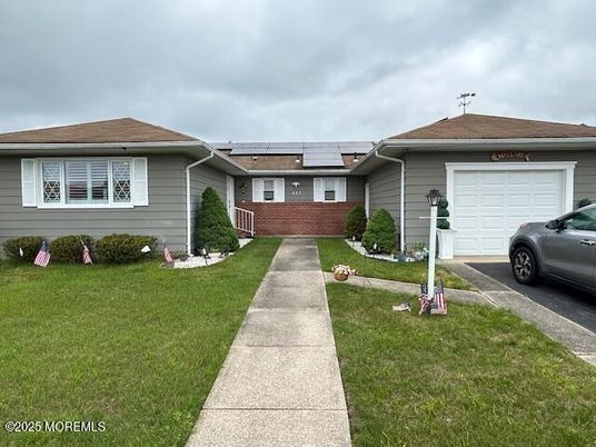 Attached, Exterior, Facade, Solar Panels, Ranch