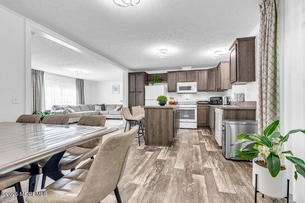 Dining room, Interior, Kitchen, Living room, Stainless Steel Appliances, Wood Texture Flooring