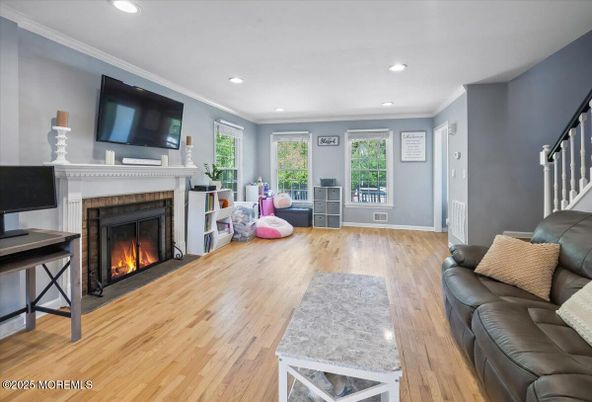 Fireplace, Interior, Recessed Lighting, Wood Texture Flooring