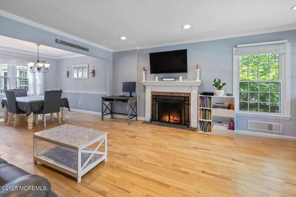 Chandelier, Dining room, Fireplace, Interior, Recessed Lighting, Wood Texture Flooring