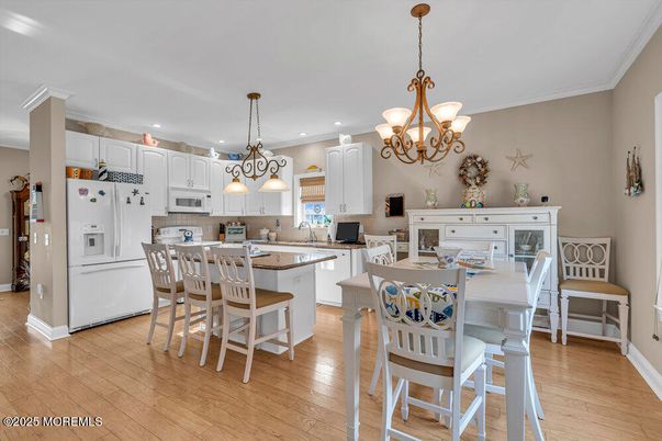 Chandelier, Dining room, Interior, Kitchen, Pendant Lights, Recessed Lighting, Wood Texture Flooring