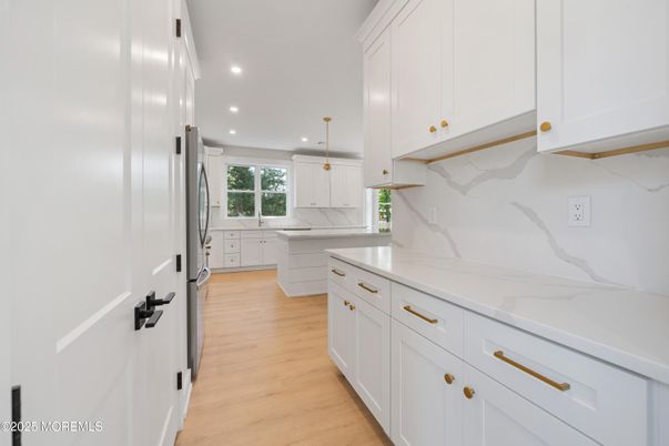 Interior, Kitchen, Marble Walls, Pendant Lights, Recessed Lighting, Wood Texture Flooring