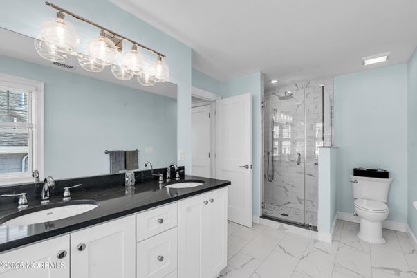 Bathroom, Dual Sink Vanities, Glass Shower, Interior, Marble, Recessed Lighting