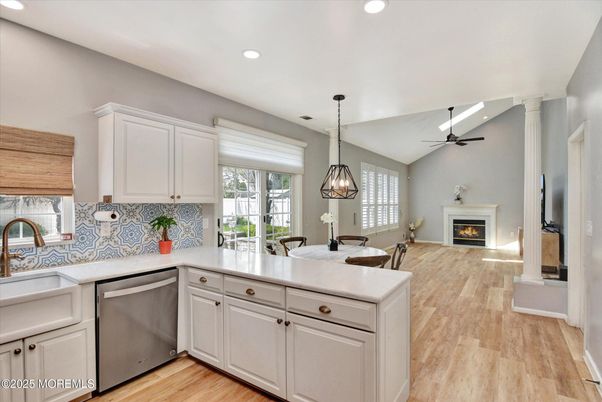 Dining room, Fireplace, Interior, Kitchen, Pendant Lights, Recessed Lighting, Wood Texture Flooring
